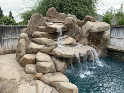 Add a rock waterfall to your pool with the best swimming pool contractor in Butte County.